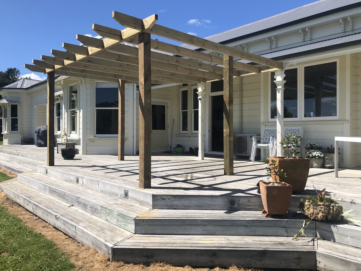 Pergola on heritage villa deck, wide angle, Wairarapa